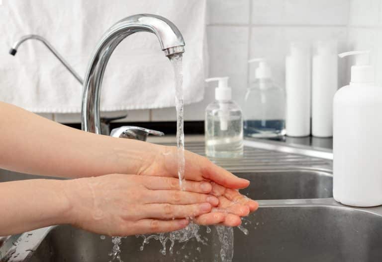 Woman washing hands with antibacterial soap and water. Hygiene concept. Coronavirus protection hand antiseptic hygiene. Skin disinfectant for healthcare