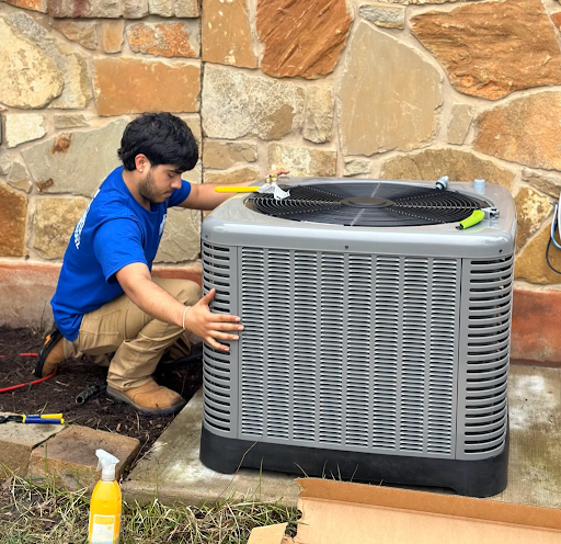 Parobek tech installing an air conditioner unit